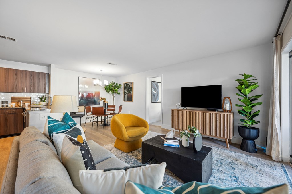 a living room with a couch and a tv