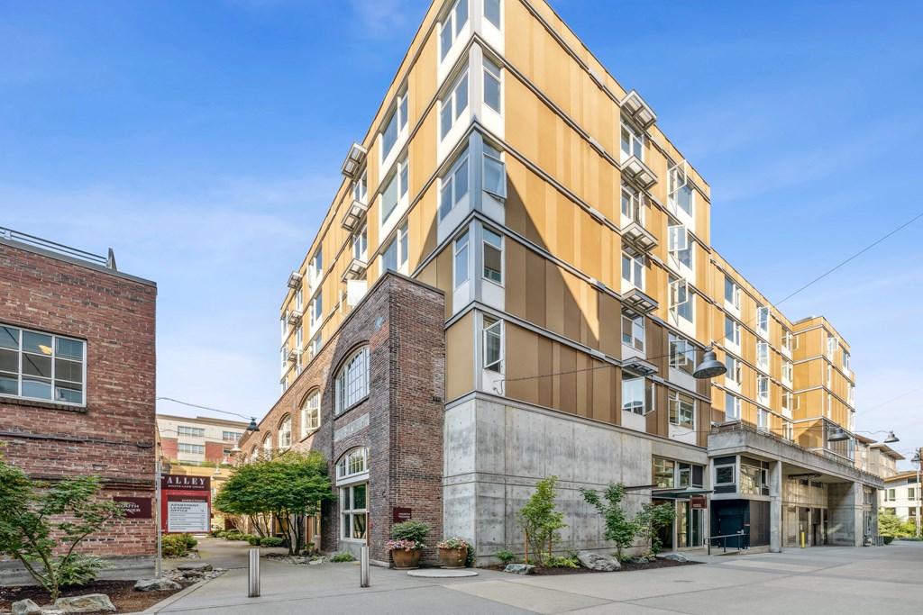 a tall building with a street in front of it