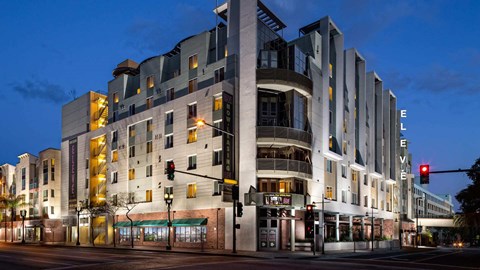 A modern building with the word "ELEVEN" on the side.