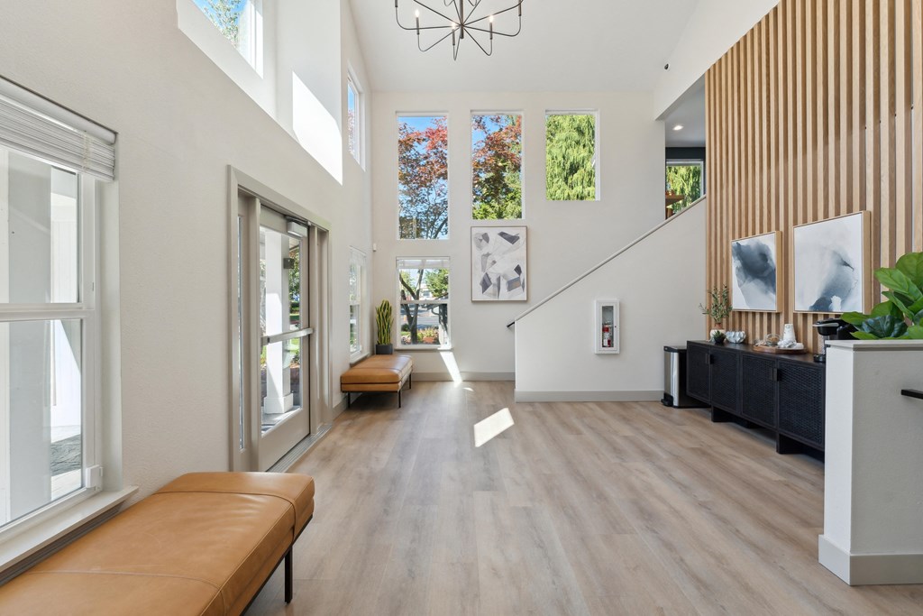 a living room with a couch and a large window