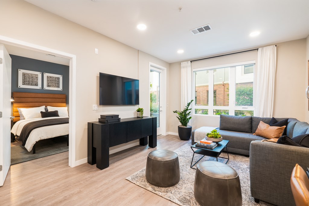 a living room with a couch and a tv