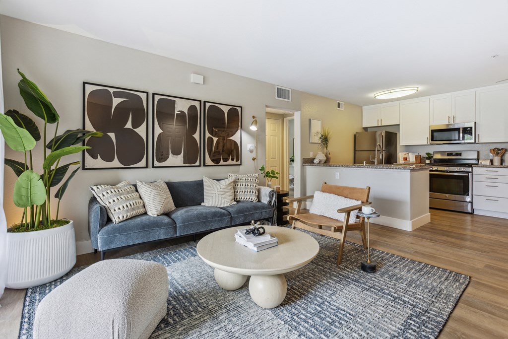 a living room with a couch and a table