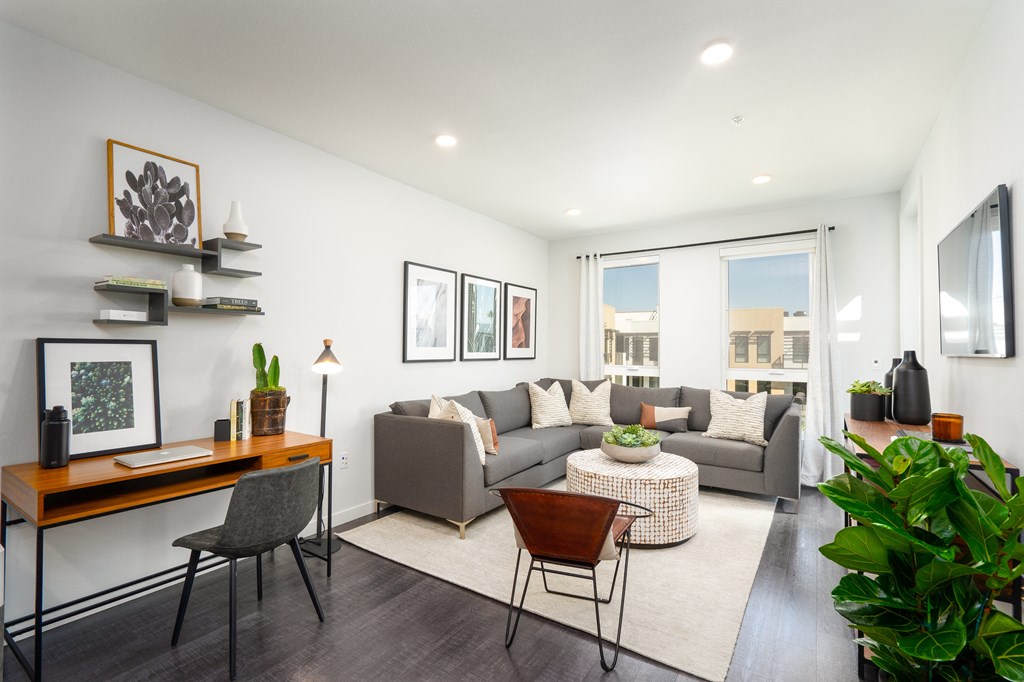 a living room with a couch and a table