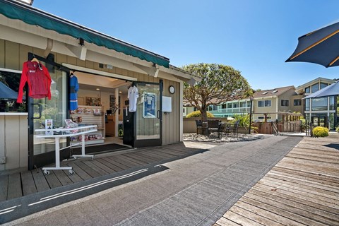 a store on the boardwalk at the enclave at woodbridge apartments in sugar land, tx