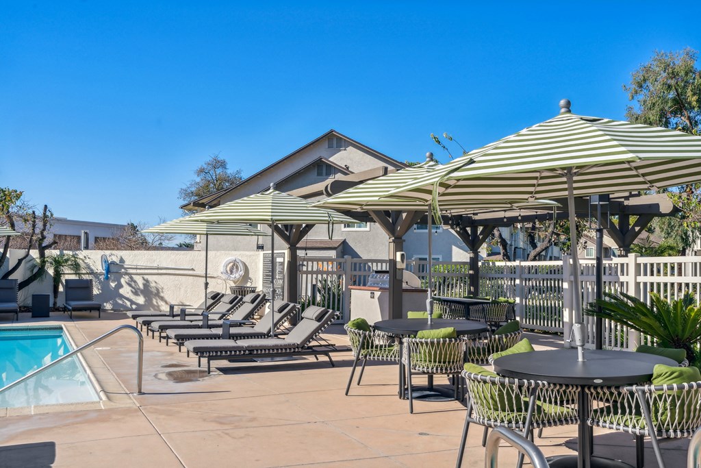 the pool and patio area at the resort at longboat key club