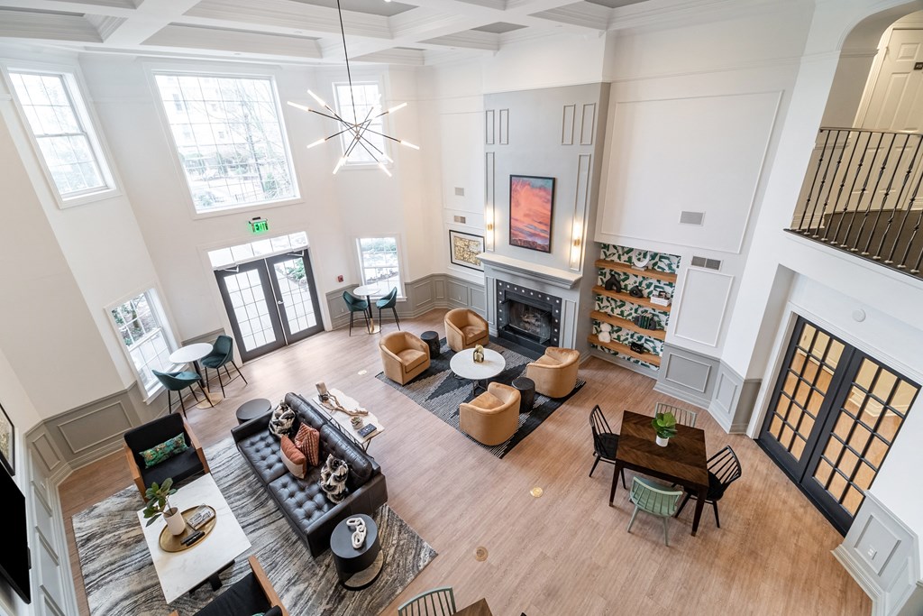 an overhead view of a living room with furniture and a fireplace