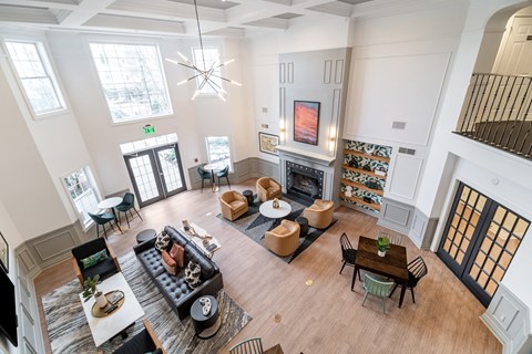an overhead view of a living room with furniture and a fireplace