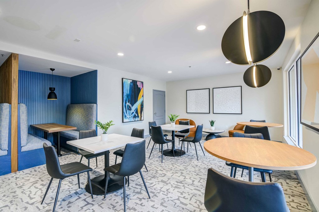 a room filled with furniture and a large window