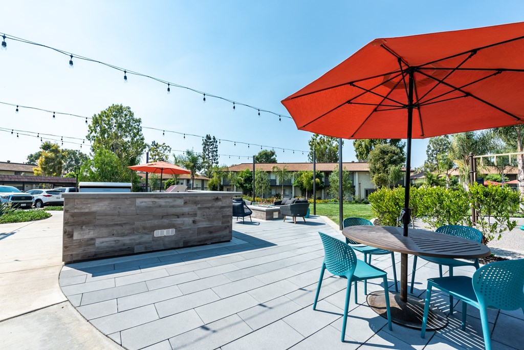 the patio at the whispering winds apartments in pearland, tx