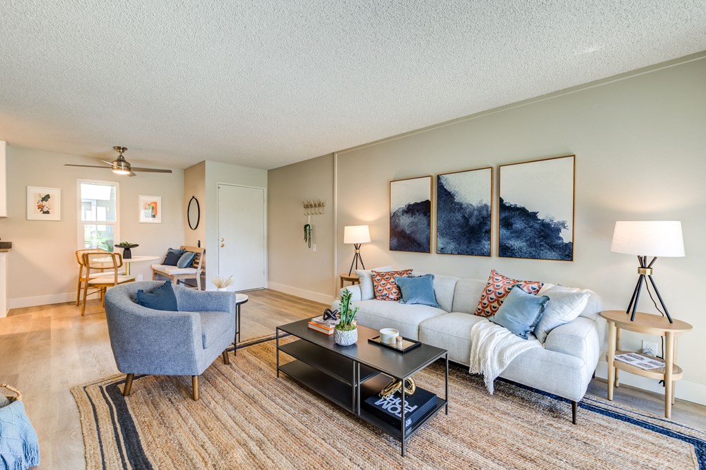 a living room with a couch and a chair