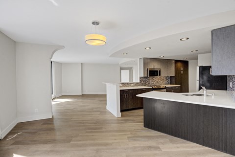 a kitchen and living room in a new home