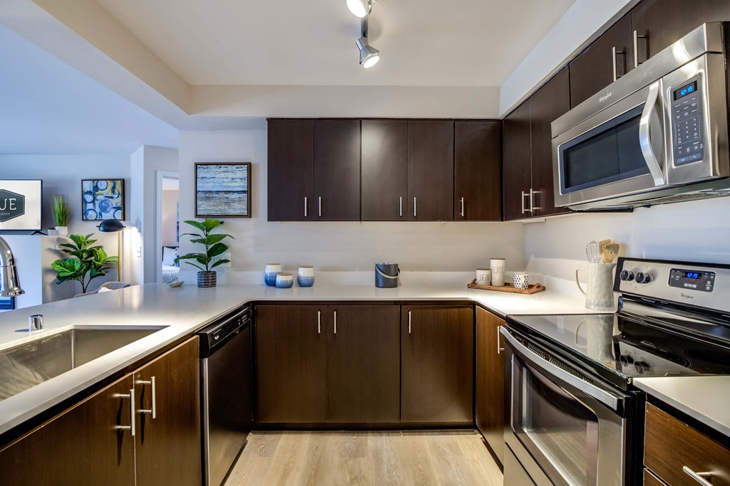 full kitchen with stainless steel appliances at the reserve at walnut creek