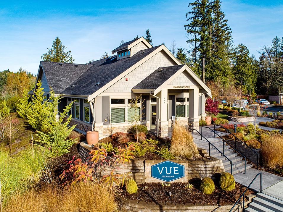 Exterior view of building with and monument sign l Vue Issaquah Apartments