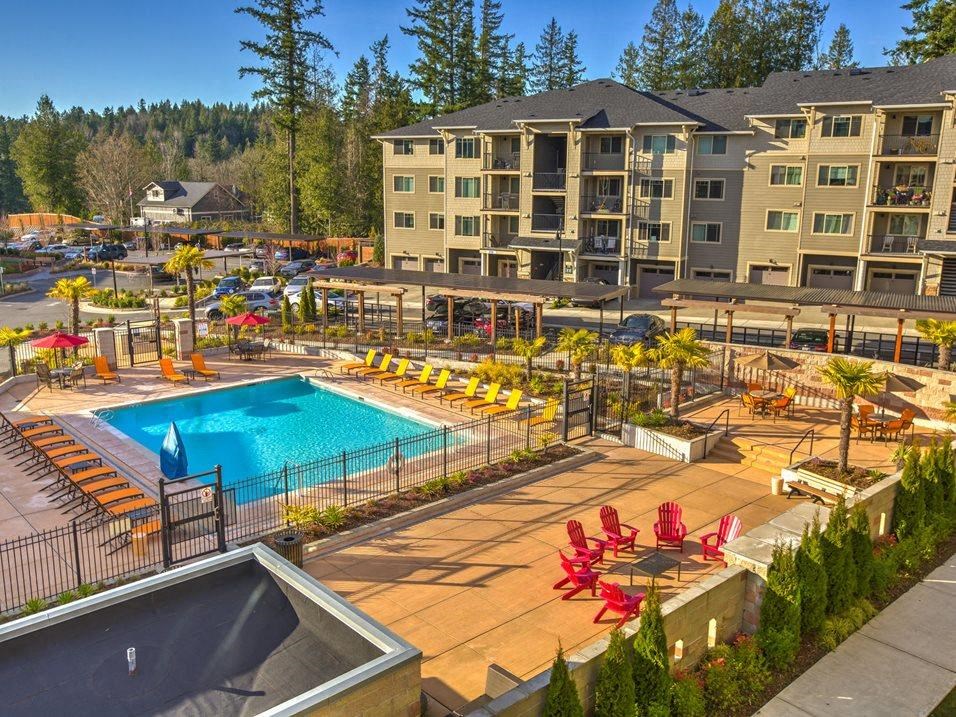 Issaquah Apartments-Vue Issaquah Sparkling Pool with Lounge Chairs
