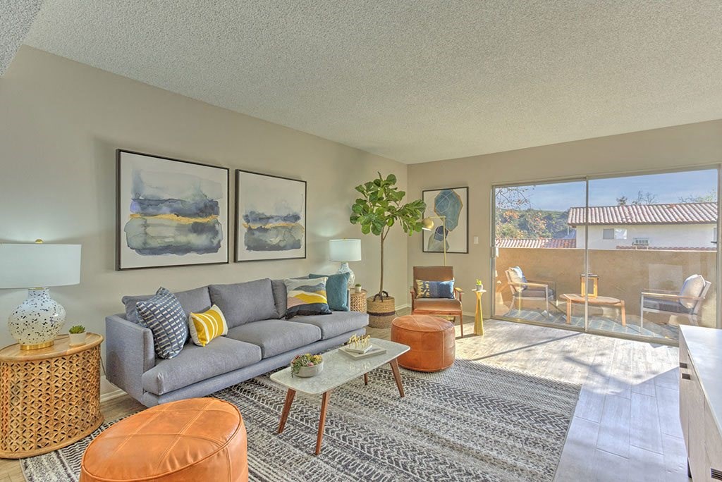 a living room with a couch and a table