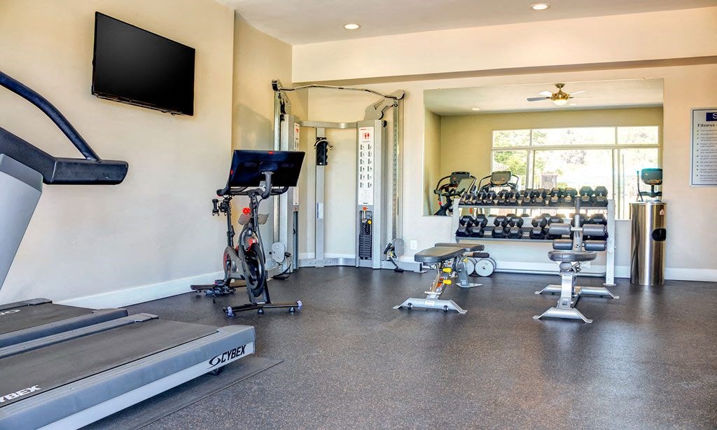 the gym at the at the boulevard apartments in