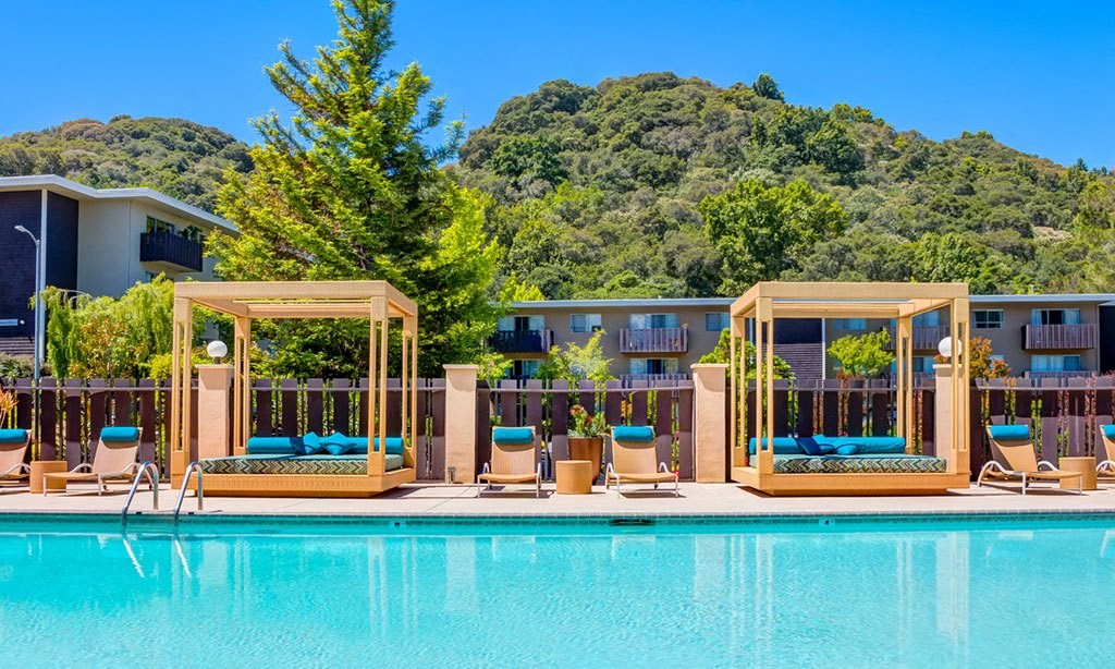 a swimming pool at the resort on a sunny day