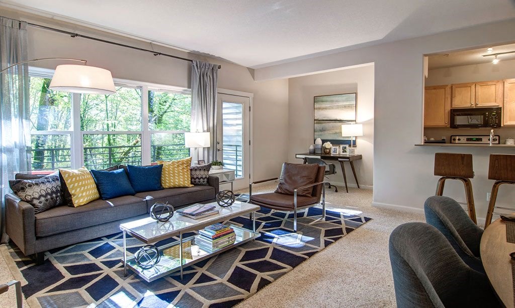 a living room with a couch and a table