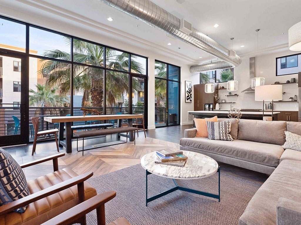 a living room with a couch and a table