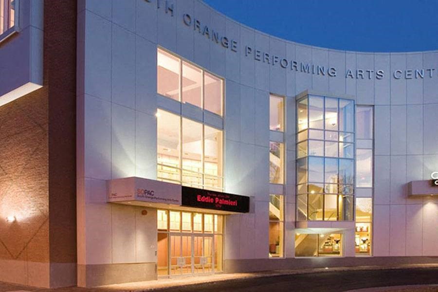 a white building with a sign on the front of it