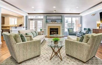 Residents club room with WiFi access, fireplace, demonstration kitchen