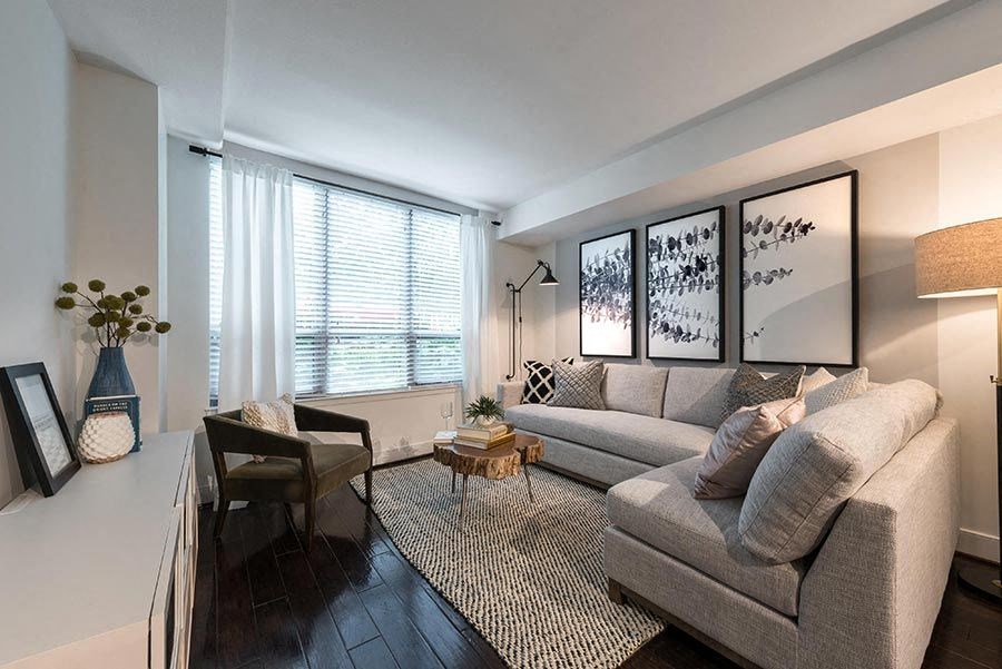 a living room with a couch and a table