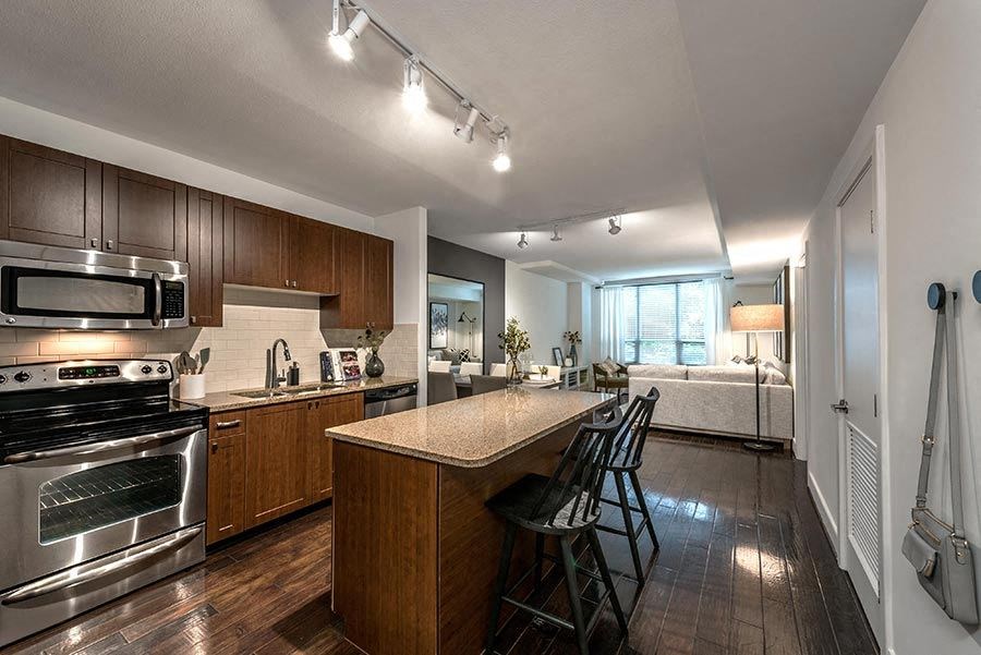 a kitchen with an island and a stove