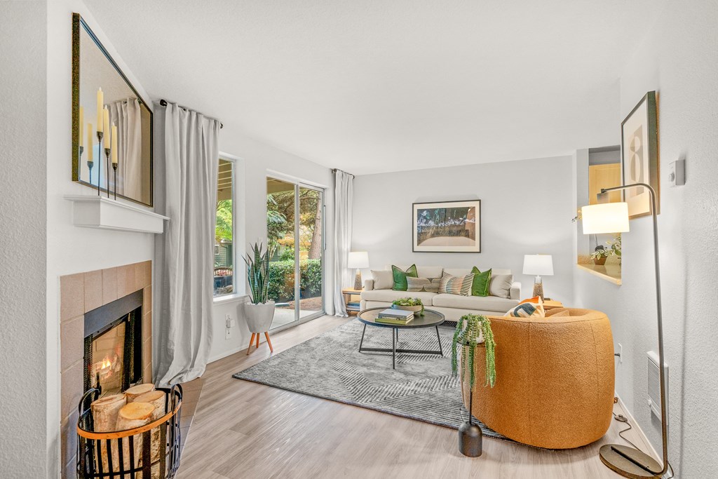 a living room with a fireplace and a couch