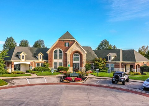 A large, well-maintained building with a driveway in front at Twin Fountains Apartments, Mason, 45040
