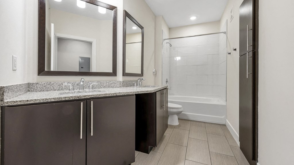 a bathroom with a sink and a toilet and a shower at Vanguard Crossing, St. Louis, MO 63124