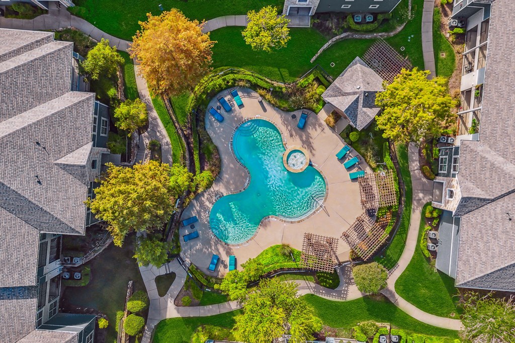an aerial view of the pool at the resort at longboat key club
