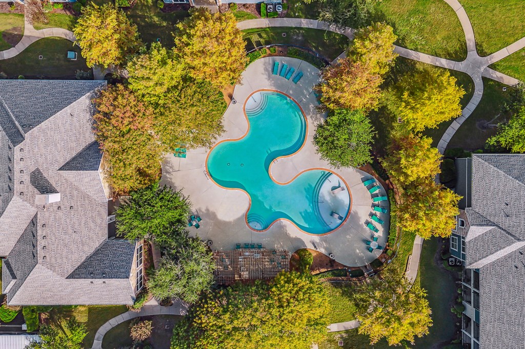 a birds eye view of the pool at the resort at governors island