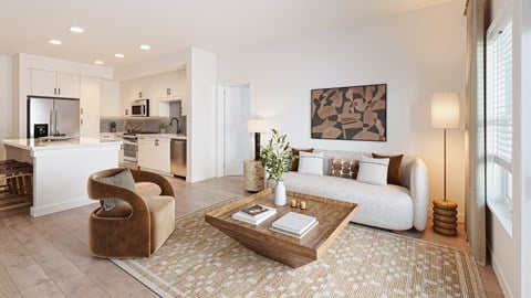 A living room with a brown chair and a white couch.