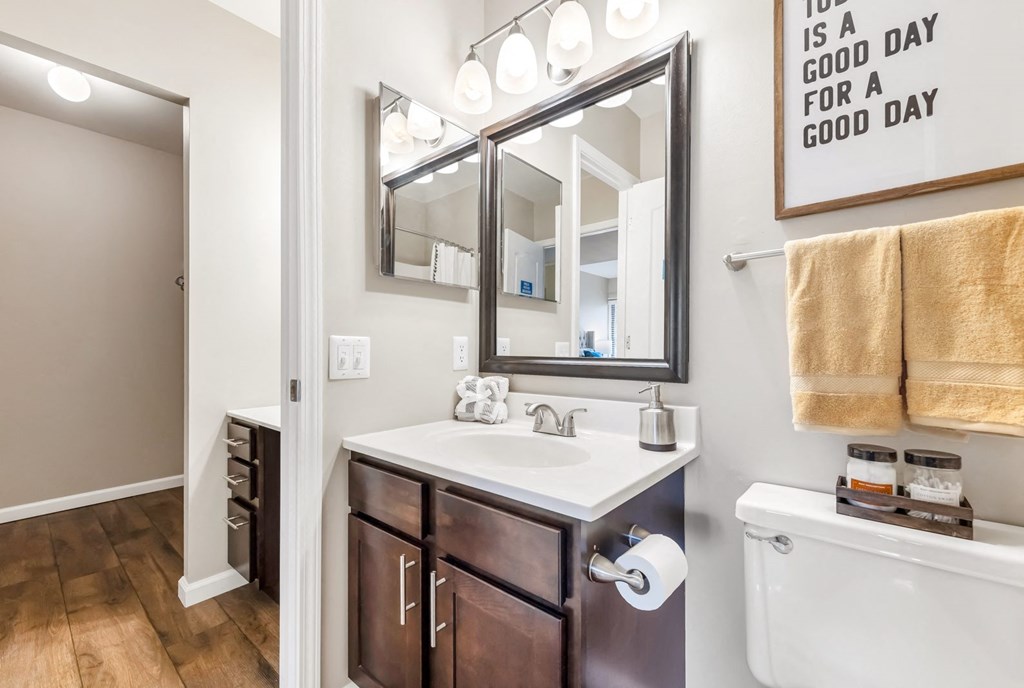 Bathroom With Vanity Lights at Whisper Hollow Apartments, Missouri