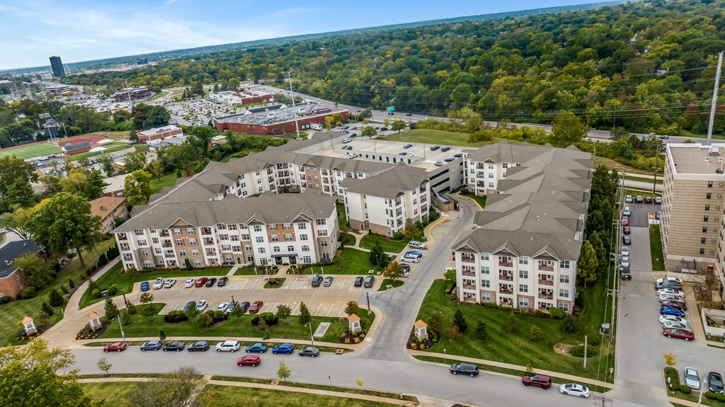 an aerial view of an apartment complex with cars parked in a parking lot at Vanguard Crossing, St. Louis, Missouri