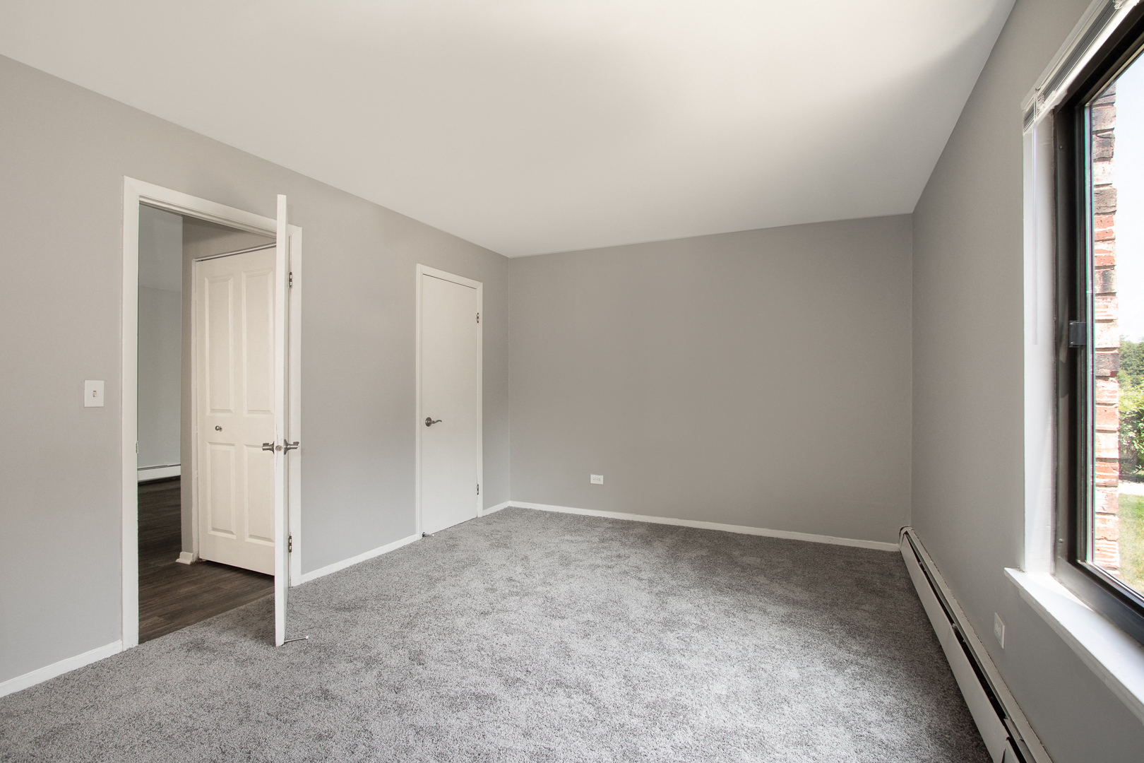 Spacious Bedrooms with Windows at Emerald Pointe Apartments, Vernon Hills, Illinois