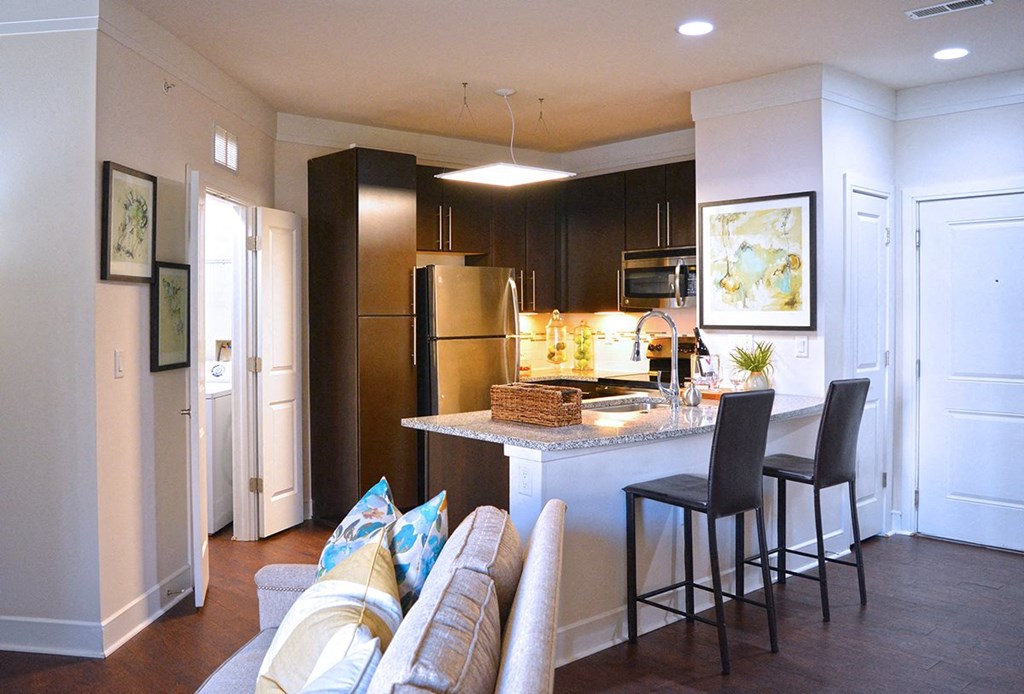 Fitted Kitchen With Island Dining at Vanguard Crossing, Missouri