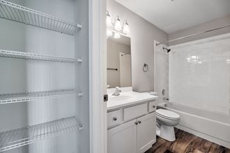 Bathroom With Bathtub Bathroom With Bathtub at Glen Hills Apartments, Glendale, WI