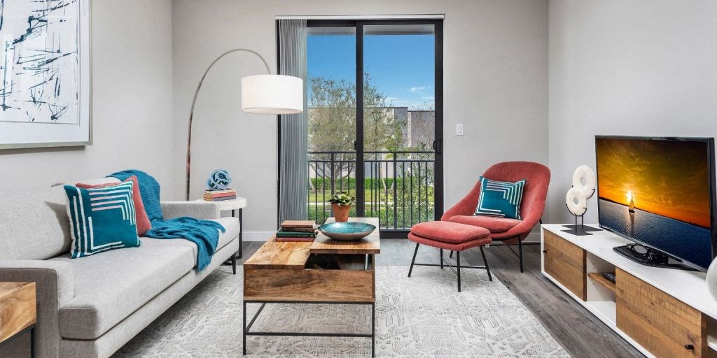 a living room with a couch and a tv