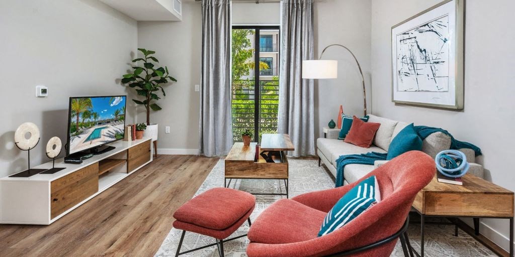 a living room with a couch and a tv