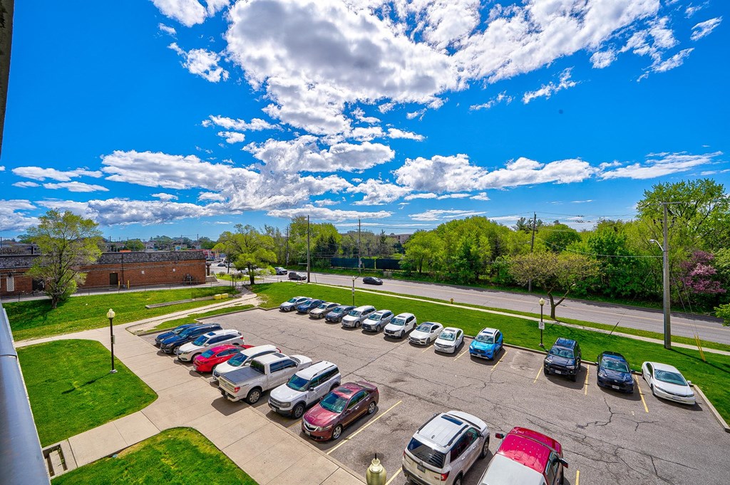 an aerial view of a parking lot full of cars