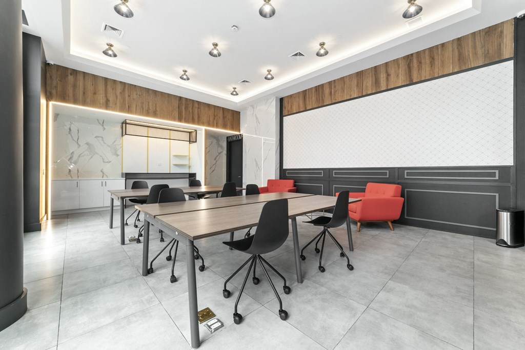 a conference room with a large table and chairs