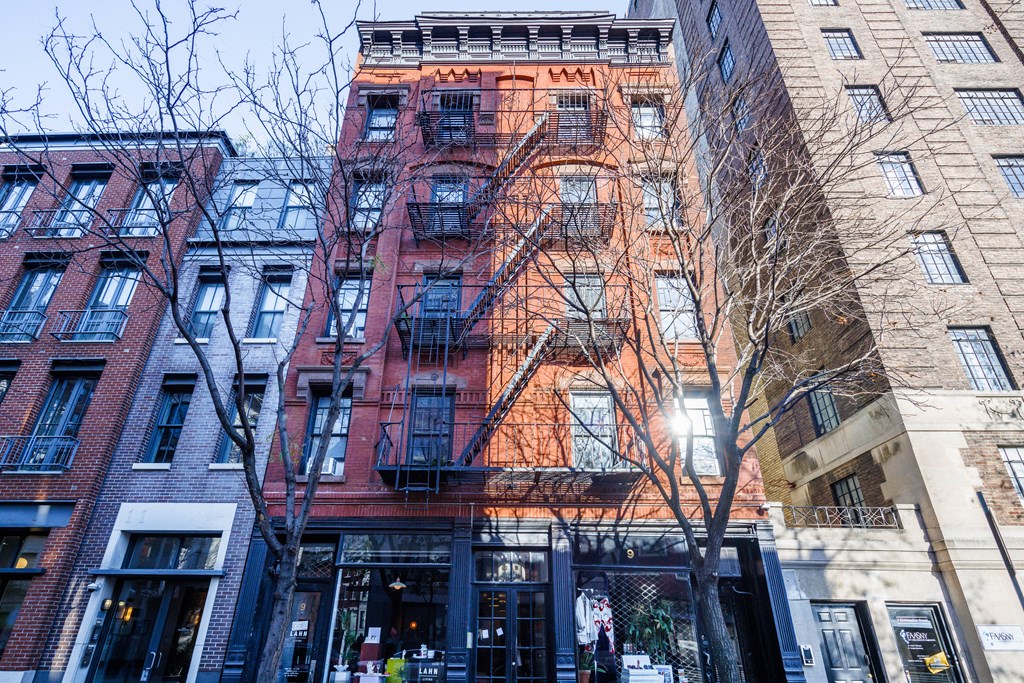 a fire escape on the side of a brick building