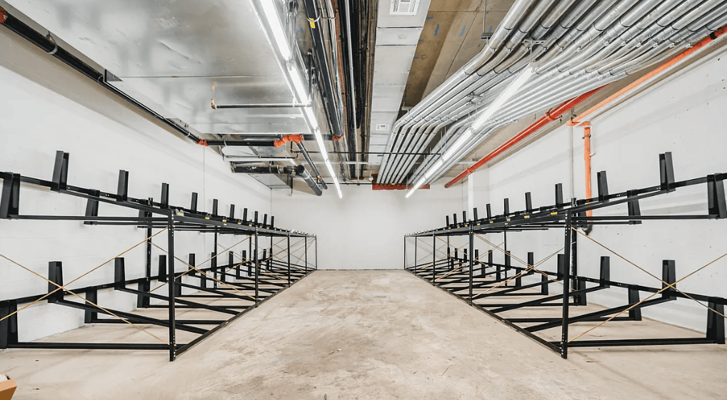 a room filled with scaffolding in a warehouse