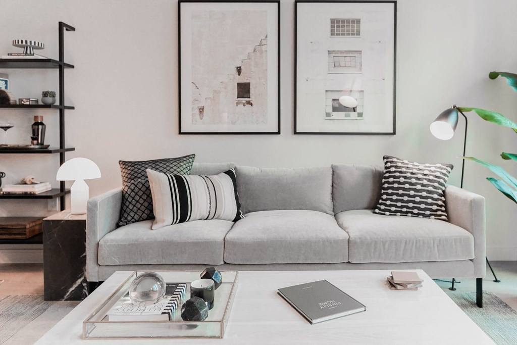 a living room with a couch and a coffee table at The Lively, Jersey City, NJ