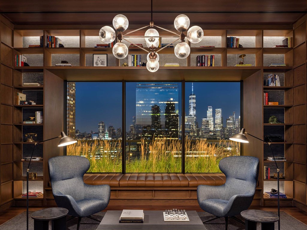 a living room with a view of the city at The Lively, New Jersey, 07302