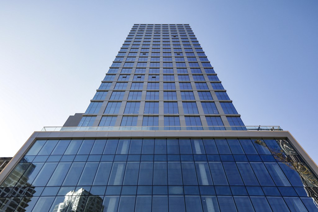 looking up at the south facade of one madison plaza in downtown at The Paxton, Brooklyn