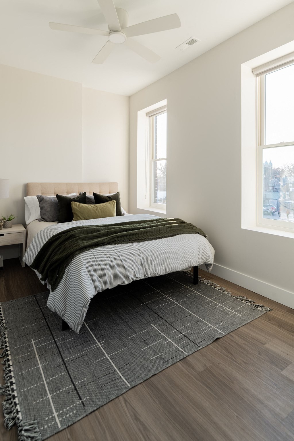 a room with a wall with a bed in it