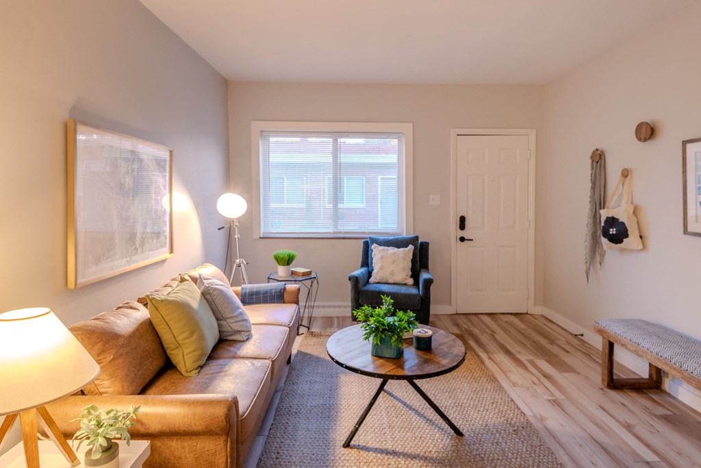 a living room with a couch and a coffee table
