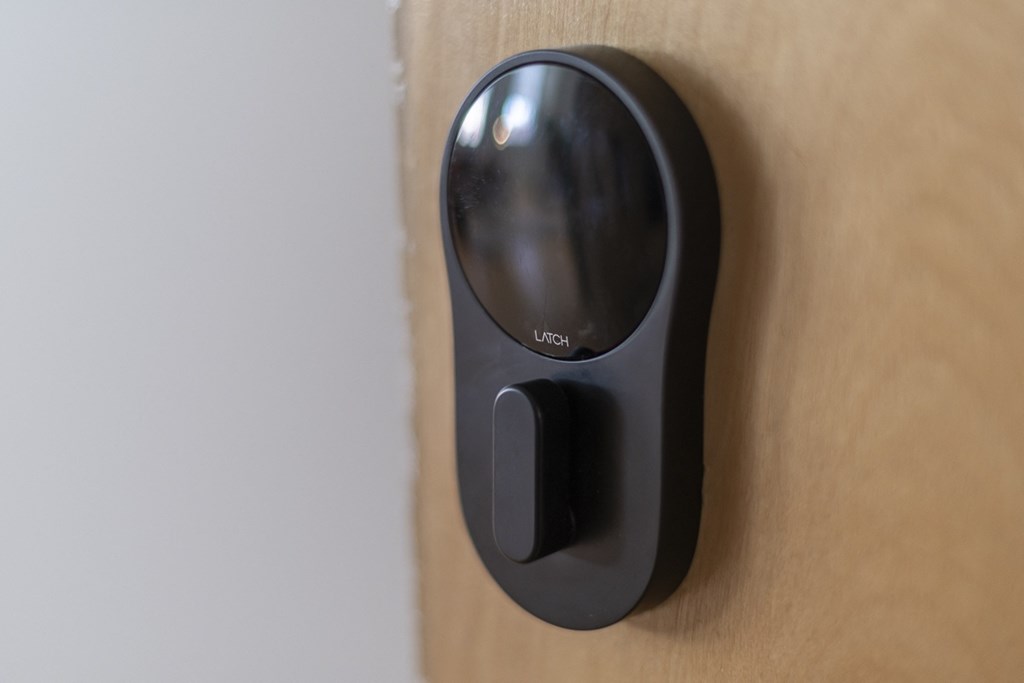 a black door knob on a wooden door
